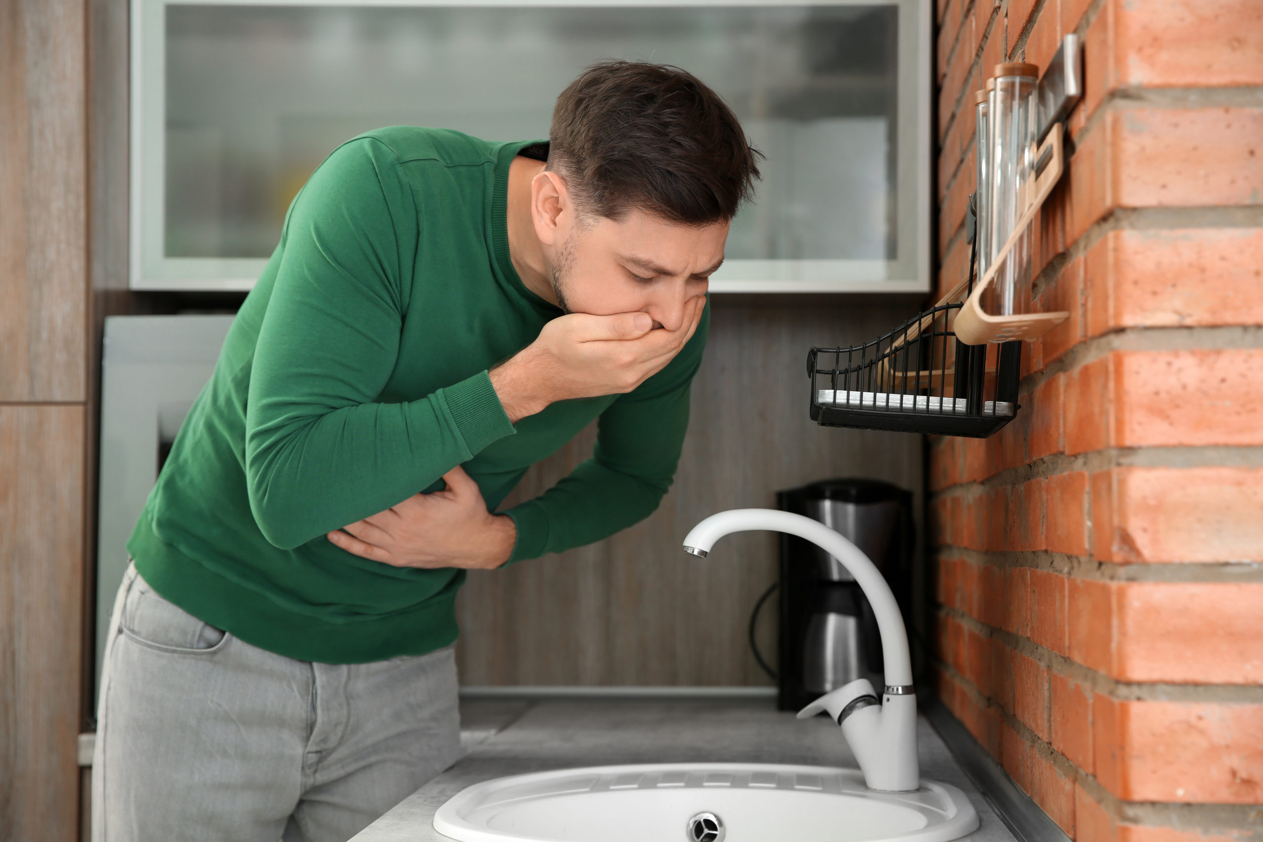 Young,Man,Having,Nausea,In,Kitchen.,Feeling,Sick
